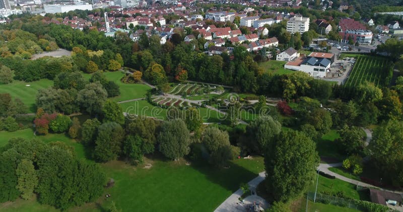 Aerial copter flight over beautiful blooming Wertwiesenpark in Heilbronn, Germany. 4k footage.