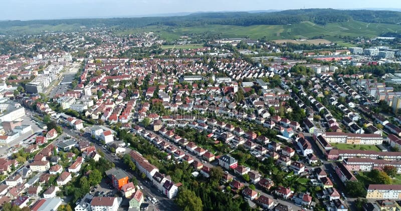 Aerial copter flight over european city Heilbronn in Germany, 4k footage. Summer time. Panorama view.