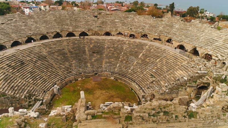 Aerial copter flight to old historic Antique Theater in Side, Turkey. Close-up footage. Slow motion, 4k.