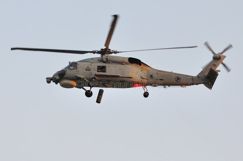 Aerial Display of Skyhawk Naval Helicopter at NDP Editorial Photography