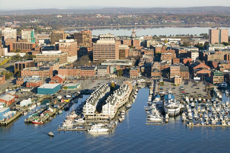 Aerial of downtown Portland Harbor and Portland Maine with view of Maine Medical Center, Commercial street, Old Port and Back
