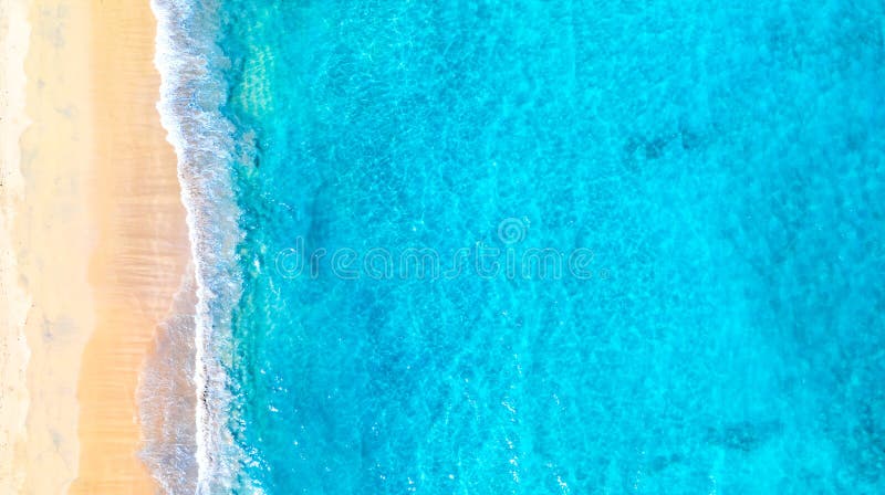 Aerial drone image of beautiful paradise Maldives tropical beach. Ocean seashore with beautiful turquoise water and sea waves.