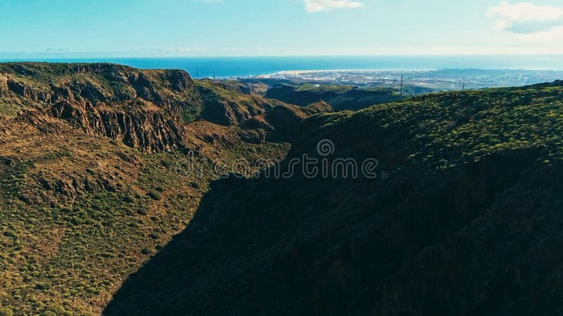 aerial drone image of beautiful stunning landscape cliffs and valleys and Maspalomas and playa ingles in the background on a sunny royalty free stock photography aerial drone image of beautiful stunning landscape cliffs and valleys and Maspalomas and playa ingles in the background on a sunny royalty free stock photography