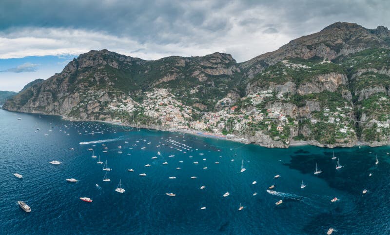 Aerial drone panoramic view of Positano village beach in Amalfi coast in the morning