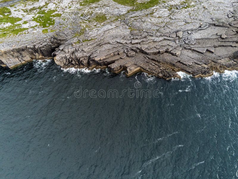 Aerial drone view, landscape in Burren region, county Clare Ireland. Mini cliffs and Atlantic ocean