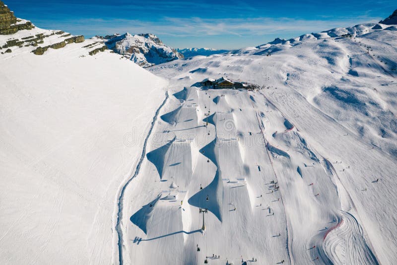 Aerial drone view of Madonna di Campiglio and ursus snowpark in Val Rendena dolomites Italy