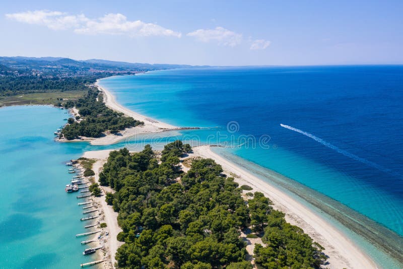 Aerial drone view of Port Glarokavos and lagoon beach in Chalkidiki Kassandra Greece