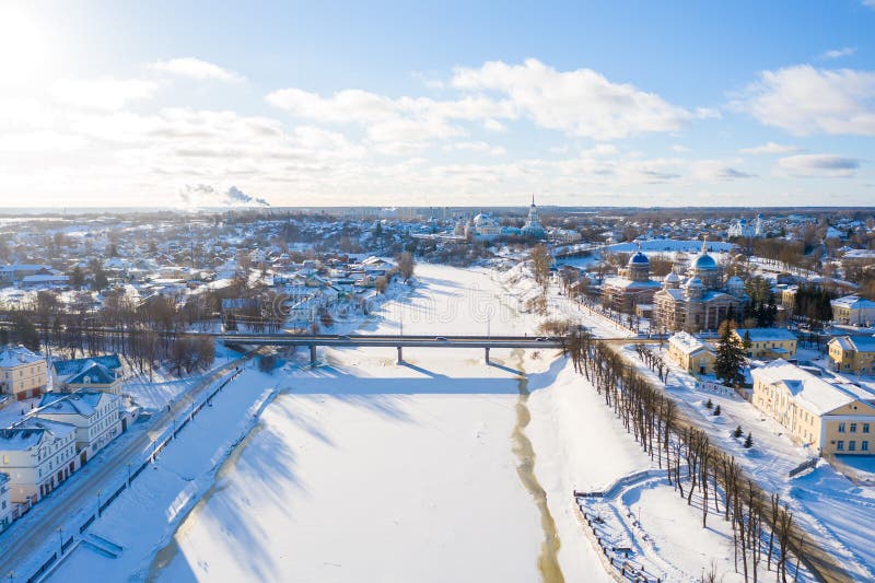 Aerial drone view of Torzhok city center with Tvertsa river, Russia. Russian winter landscape