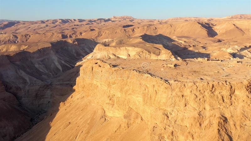 Aerial footage over Masada National Park at sunrise, Dead sea, israel