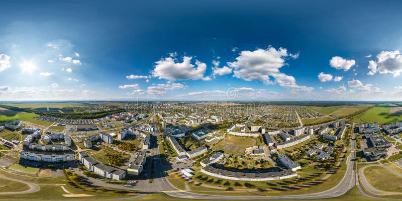 aerial full seamless spherical 360 hdri panorama view above great height of small provincial town with private sector and high-rise apartment buildings in equirectangular projection.