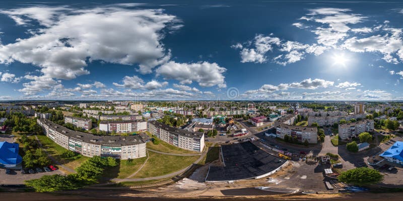 aerial full seamless spherical 360 hdri panorama view in city overlooking of residential area of high-rise buildings in