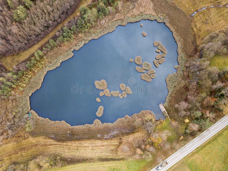 Aerial image of a pond with floating turf mats royalty free stock image