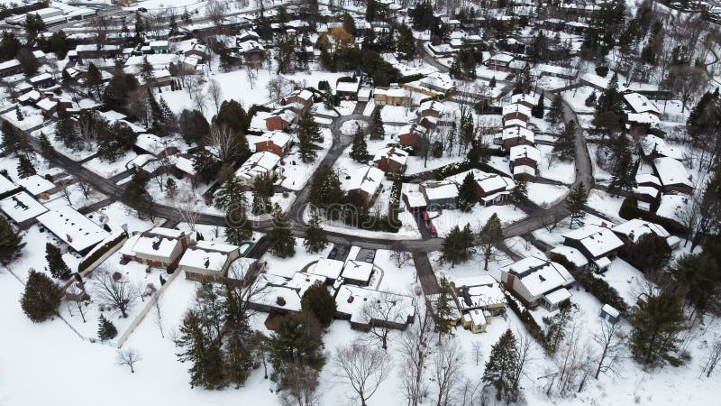 Aerial of the Kanata neighborhood in winter. Suburbian houses covered with snow. Kanata, Ottawa, Ontario, Canada