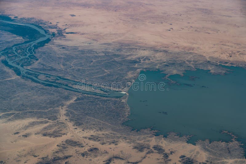 Aerial Landscape view of area around the Merowe Dam in norther Sudan, located at Nile river surrounded by desert stock image