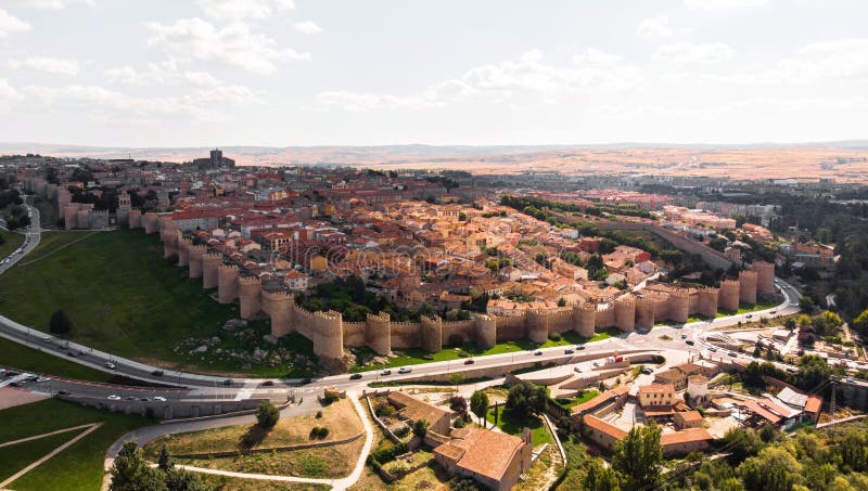 Aerial panoramic view of historical medieval fortress city town stone wall in Avila Castile and Leon Spain