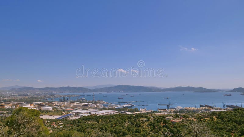 Aerial panoramic view of Lemos, Vouliagmeni, Greece under blue sky; Blue sky and beautiful city