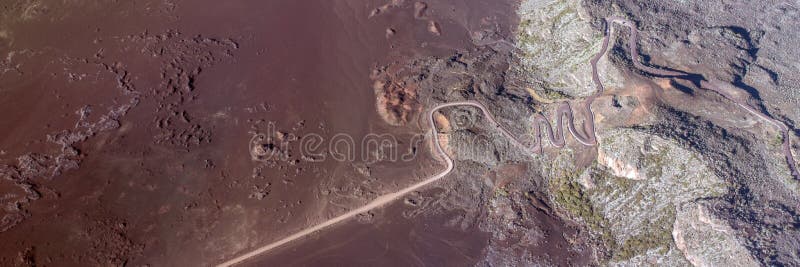 Aerial photo of Road in volcanic landscape of Plaine des Sables, Reunion Island stock photos Aerial photo of Road in volcanic landscape of Plaine des Sables, Reunion Island stock photos