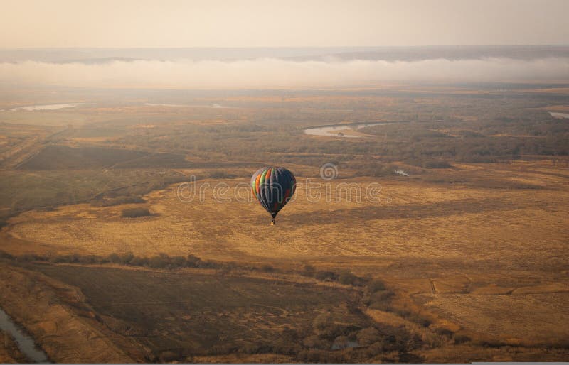 Aerial picture of aerostatic balloon above the field royalty free stock image Aerial picture of aerostatic balloon above the field royalty free stock image