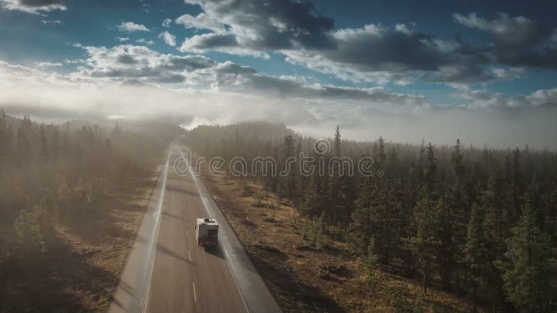 Aerial of rv driving on icefields parkway in jasper