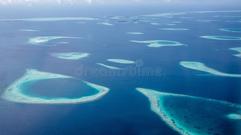 Aerial shot of coral reef in the Maldives stock photo