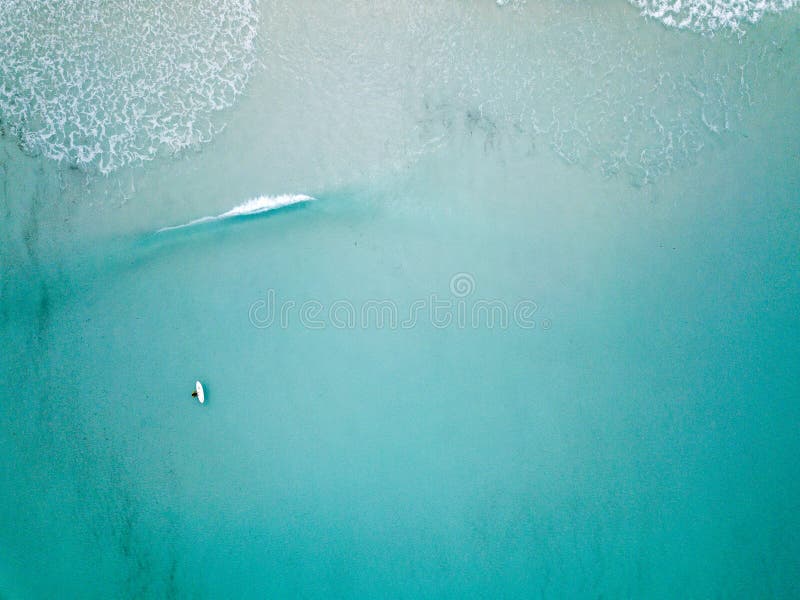 Aerial shot of surfer a lone no sharks to be seen