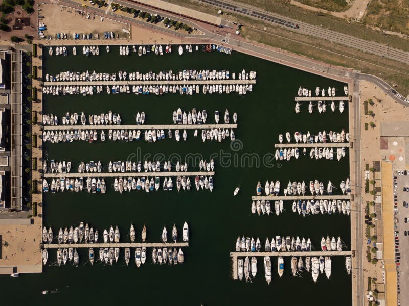 Aerial shot of white boats in a port stock photography