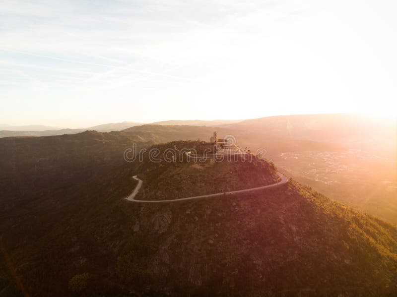 Aerial sunrise panorama of mountain hill top church chapel Sanctuary Nossa Senhora da Granca in Mondim de Basto Portugal