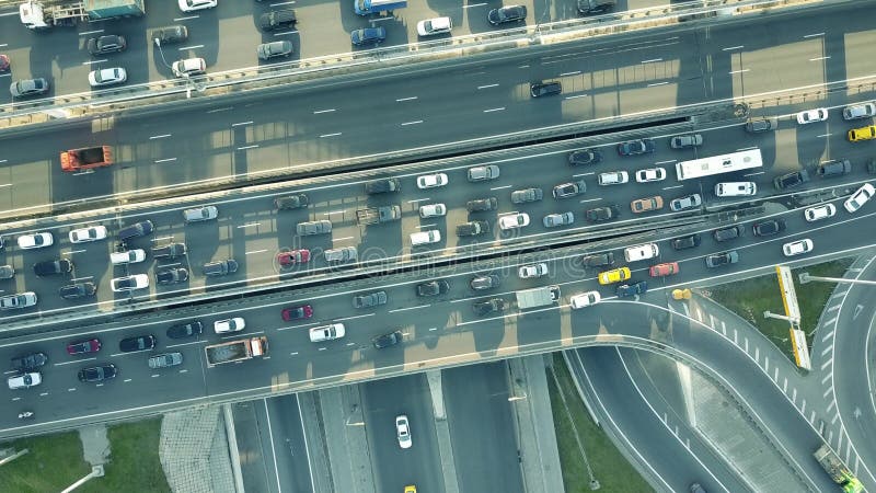 Aerial top down shot of a traffic jam on a car road intersection in the rush hour