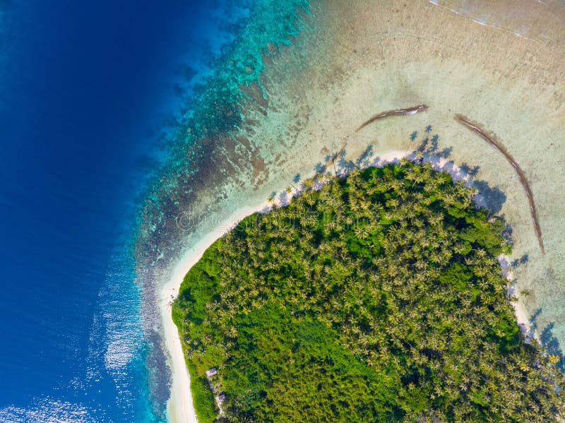 Aerial top down view Banyak Islands Sumatra tropical archipelago Indonesia, coral reef white sand beach beach turquoise water.