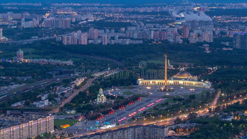 Aerial top view of Moscow city day to night timelapse after sunset. Form from the observation platform of the business