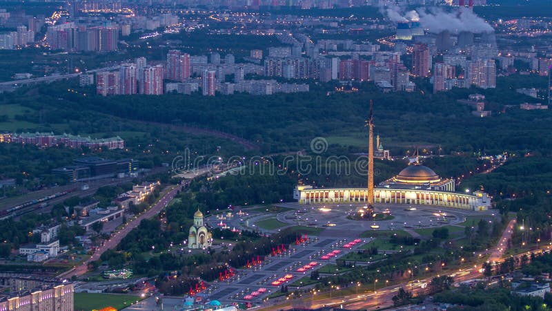 Aerial top view of Moscow city day to night timelapse after sunset. From the observation deck