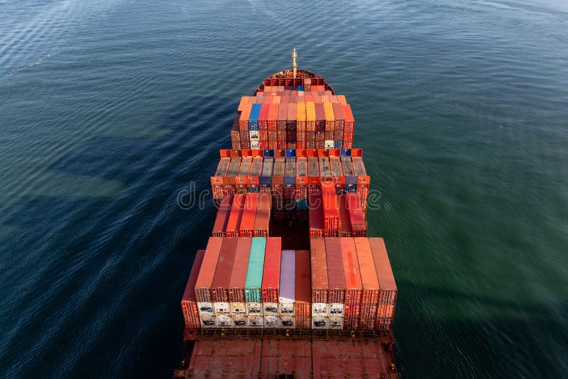 Aerial View from Above of a Cargo Ship arriving to the Port