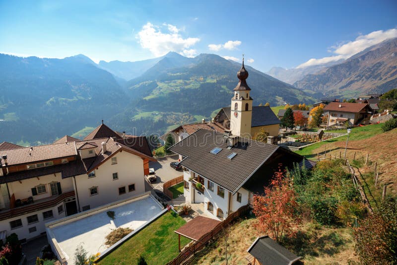 Aerial view of the alpine village of Stulles on a sunny autumn day. Stubai Alps, South Tyrol, Italy