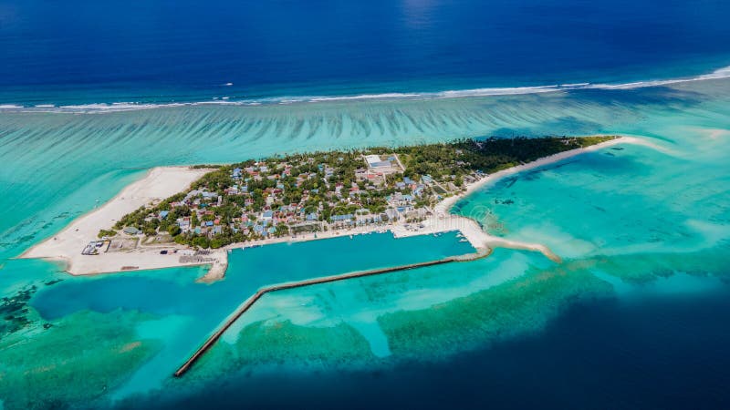 Aerial view of the amazing beautiful Fenfushi tropical island at south Ari atoll at the indian ocean