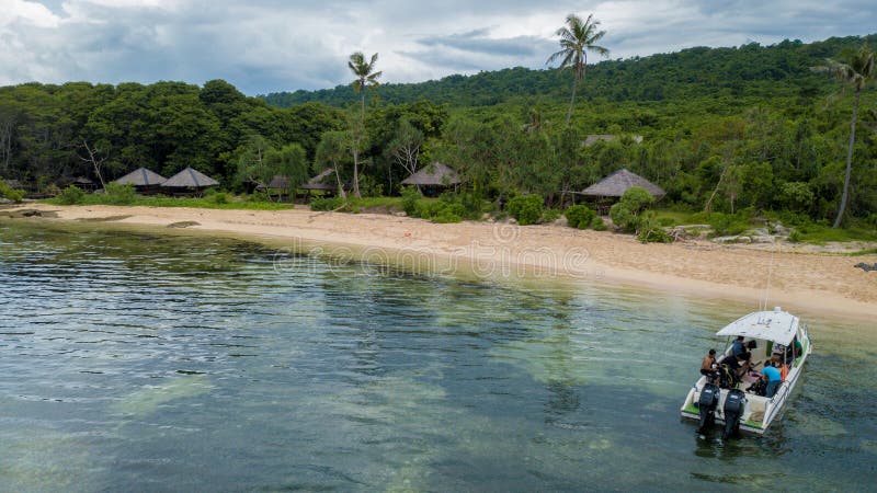 Aerial view of the beach and hills with nice sky and blue ocean