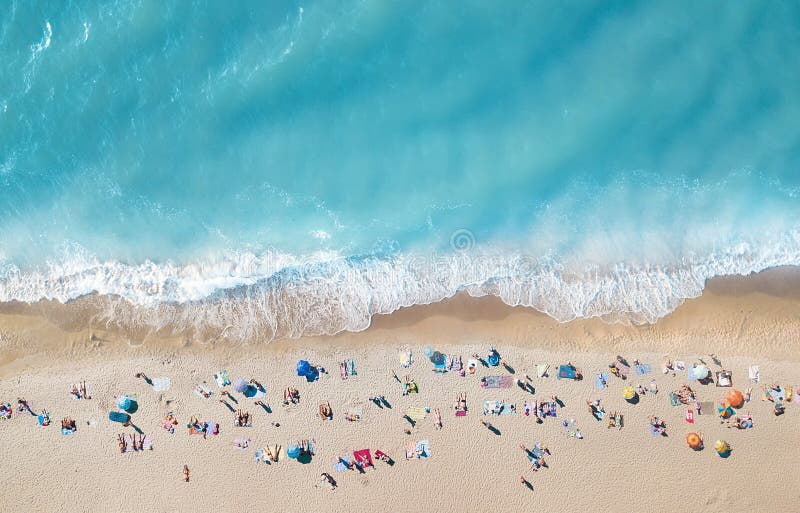 Aerial view at the beach. Turquoise water background from top view. Summer seascape from air.