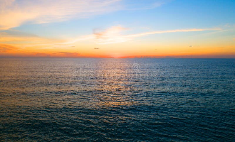 Aerial view Beautiful view sunset over sea surface beautiful wave Amazing light sunset or sunrise sky over sea Nature environment