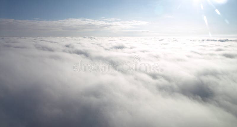 Aerial view - blue sky above the clouds