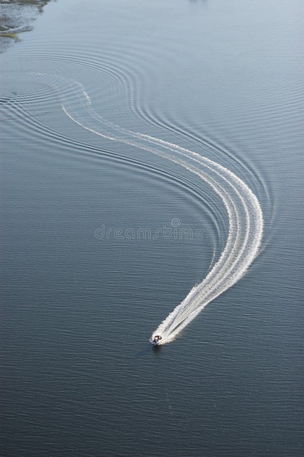 Aerial view of boat and wake