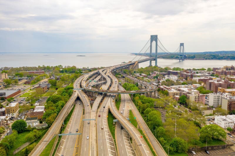 Aerial view of the Brooklyn district and the Verrazzano Narrows bridge in New York on a cloudy day