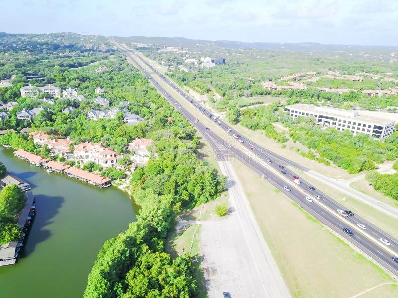 Aerial view North Capital of Texas Highway in Austin, Texas, USA. Aerial view busy traffic on North Capital of Texas Highway with green landscape of Hill Country royalty free stock photography Aerial view North Capital of Texas Highway in Austin, Texas, USA. Aerial view busy traffic on North Capital of Texas Highway with green landscape of Hill Country royalty free stock photography