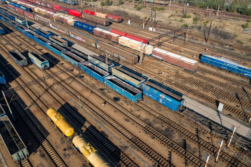 Aerial view of colorful freight trains on the railway station. Wagons with goods on railroad. Heavy industry. Industrial royalty free stock photos Aerial view of colorful freight trains on the railway station. Wagons with goods on railroad. Heavy industry. Industrial royalty free stock photos