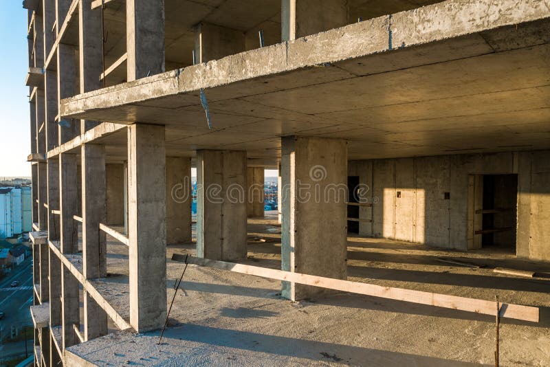 Aerial View of Concrete Frame of Tall Apartment Building Under