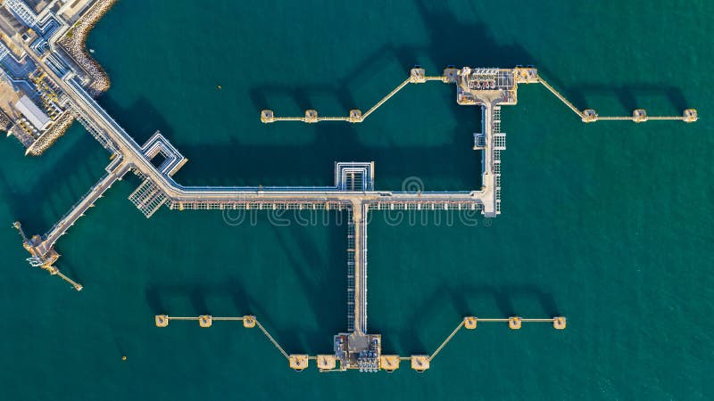 Aerial view crude oil terminal, Loading arm oil and gas refinery at commercial port stock images Aerial view crude oil terminal, Loading arm oil and gas refinery at commercial port stock images