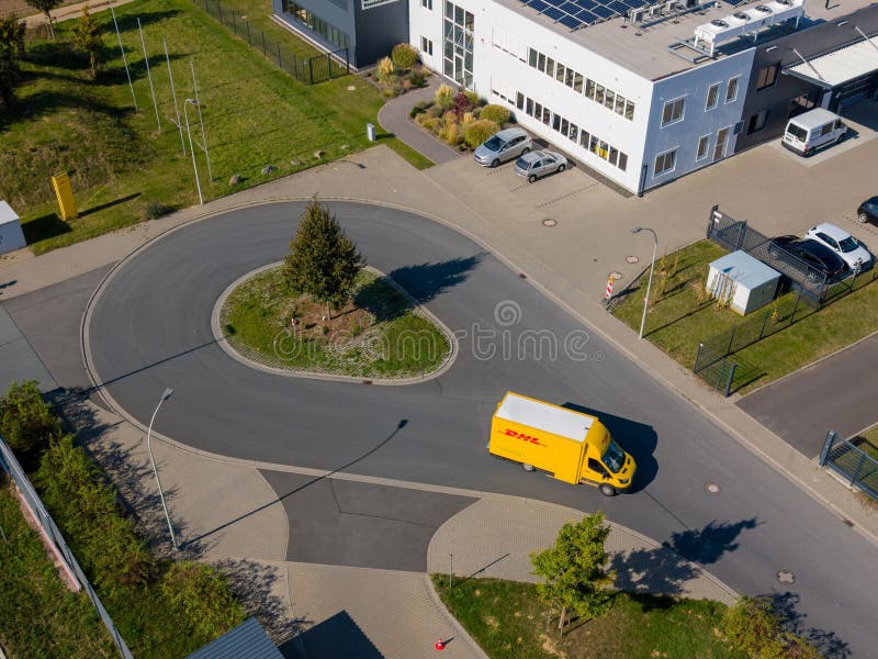 Aerial view of dhl delivery truck a on the road photo libre de droits