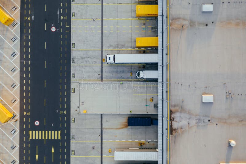 Aerial view of the distribution center, drone photography of the industrial logistic zone.