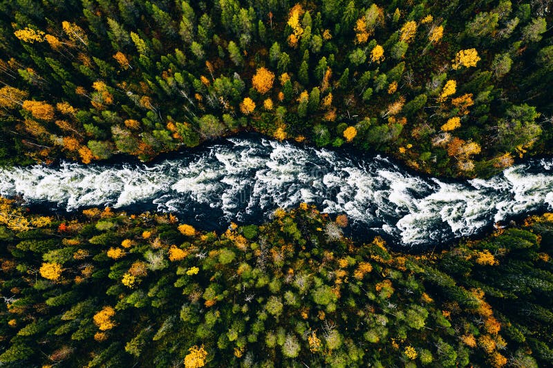 Aerial View Of Fast River Flow Through The Rocks And Colorful