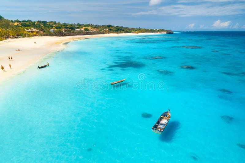 Aerial view of the fishing boats on tropical sea coast stock photos Aerial view of the fishing boats on tropical sea coast stock photos