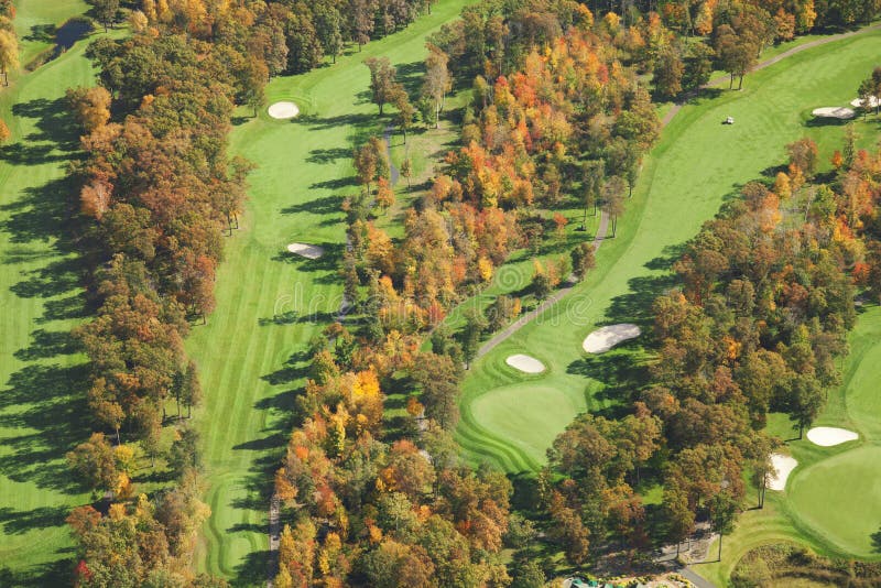 Aerial view of golf course in autumn royalty free stock photos