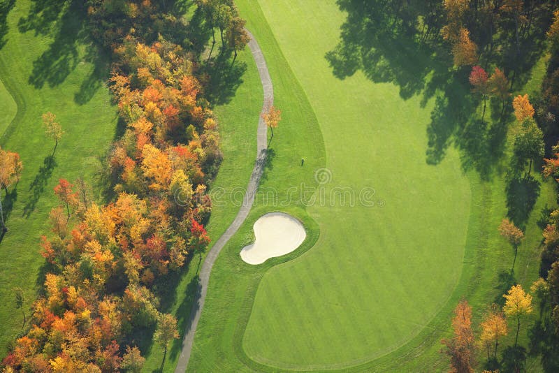 Aerial view of golf course during autumn royalty free stock image